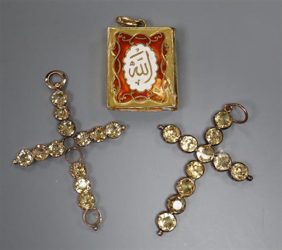 A Middle Eastern yellow metal and enamel small box modelled as a book (end missing?) 7 2 cross pendants.